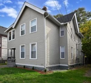 a house with a gray house at 3 Bed Spacious 1st Floor Apt at Tremont in Cleveland
