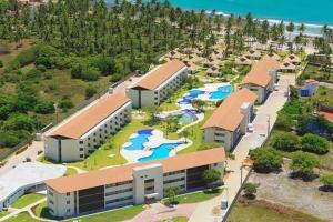 an aerial view of a building with a water park at Flat Praia dos Carneiros in Tamandaré