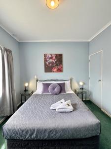 Postel nebo postele na pokoji v ubytování O'Reillys Motel