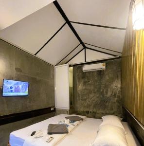 TV a/nebo společenská místnost v ubytování Tuk Tuk Guesthouse