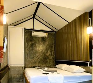 Postel nebo postele na pokoji v ubytování Tuk Tuk Guesthouse