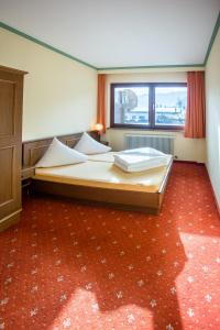 Postel nebo postele na pokoji v ubytování Appartement Pillersee