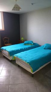 Postel nebo postele na pokoji v ubytování Villa Jules Verne - Chambres d'hôtes et gîte