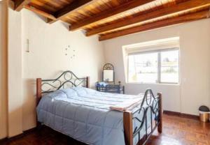 Postel nebo postele na pokoji v ubytování Casa Hermosa