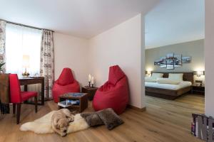 Una cama o camas en una habitación de Hotel Cervo