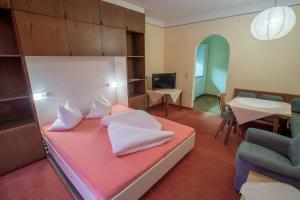 Postel nebo postele na pokoji v ubytování Appartement Pillersee