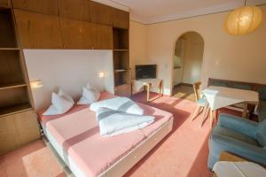 Postel nebo postele na pokoji v ubytování Appartement Pillersee