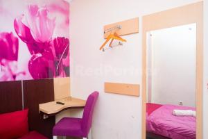 Letto o letti in una camera di Bies Malioboro Hotel RedPartner