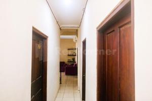 Letto o letti in una camera di Bies Malioboro Hotel RedPartner