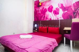 Letto o letti in una camera di Bies Malioboro Hotel RedPartner