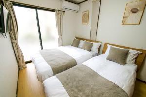 Kang's Houseにあるベッド