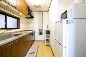 Kang's Houseにあるキッチンまたは簡易キッチン