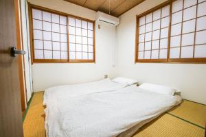 Kang's Houseにあるベッド