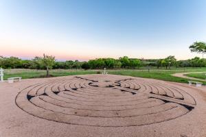 a large labyrinth in the middle of a park at Appian Way Oliva Cottage in Fredericksburg
