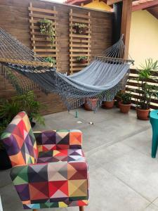 Khu vực ghế ngồi tại Mansão quadra da praia - Praia de Baixo - Pinheira