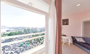 Balkón nebo terasa v ubytování Ngoc Phat Dalat Hotel