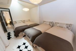 Postel nebo postele na pokoji v ubytování Hotel Beswe