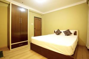 Postel nebo postele na pokoji v ubytování Nag Pukhu Guest House