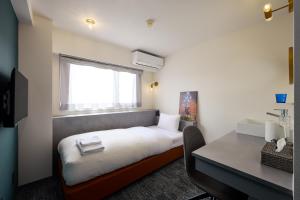 Postel nebo postele na pokoji v ubytování Hotel WWJ + 37 fotografií