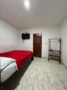 Letto o letti in una camera di Hotel Plaza Real Pereira