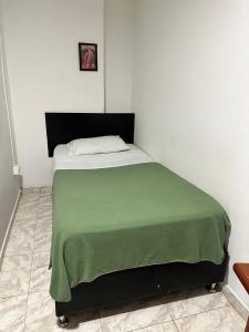 Letto o letti in una camera di Hotel Plaza Real Pereira
