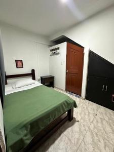 Letto o letti in una camera di Hotel Plaza Real Pereira