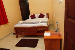 Postel nebo postele na pokoji v ubytování Jia Hill view rooms vagamon
