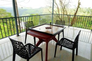 Balkón nebo terasa v ubytování Jia Hill view rooms vagamon