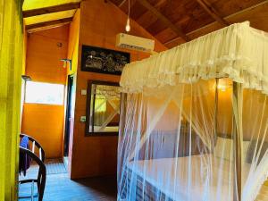 TV o dispositivi per l'intrattenimento presso Sungreen Cottage Sigiriya