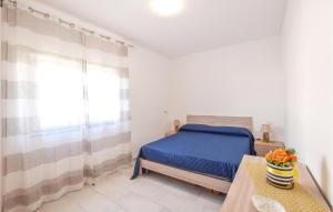 Posteľ alebo postele v izbe v ubytovaní Beautiful Apartment In Nicotera Marina