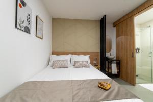 Postel nebo postele na pokoji v ubytování Casa Gracia Hotel Boutique
