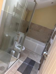 Ένα μπάνιο στο Seaford Guest House Pri