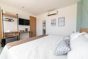 Postel nebo postele na pokoji v ubytování Casa Gracia Hotel Boutique