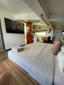 Postel nebo postele na pokoji v ubytování Italy Condotel Darasa