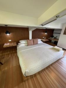 Postel nebo postele na pokoji v ubytování Italy Condotel Darasa