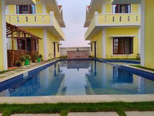 Bazén v ubytování SK Grand Private Pool Villa Mahabalipuram by Royal Experiences nebo v jeho okolí