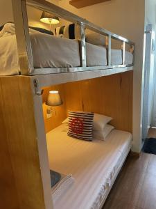 Postel nebo postele na pokoji v ubytování Italy Condotel Darasa