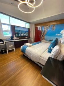 Postel nebo postele na pokoji v ubytování Italy Condotel Darasa