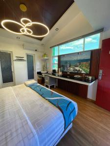 Postel nebo postele na pokoji v ubytování Italy Condotel Darasa