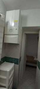 A bed or beds in a room at Momenti e Monumenti