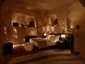 A bed or beds in a room at Argos in Cappadocia