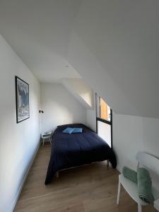 Postel nebo postele na pokoji v ubytování Villa Larmor-baden