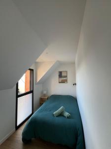 Postel nebo postele na pokoji v ubytování Villa Larmor-baden