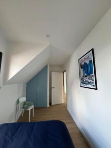 Postel nebo postele na pokoji v ubytování Villa Larmor-baden