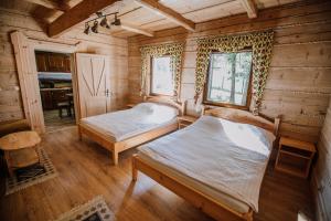 Ένα ή περισσότερα κρεβάτια σε δωμάτιο στο Apartamenty Aleksandra +100 φωτογραφίες
