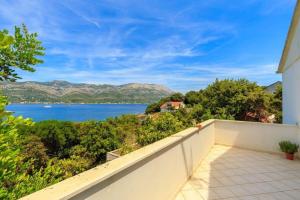 a view of the water from the balcony of a house at House Marija in Korčula
