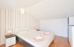 Posteľ alebo postele v izbe v ubytovaní Two-Bedroom Apartment In Stanici