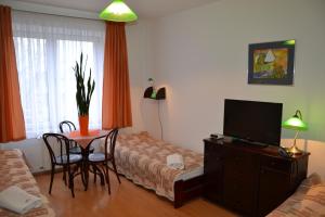 Telewizja i/lub zestaw kina domowego w obiekcie Hotel Monttis