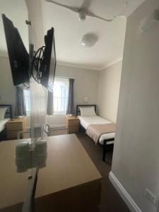 Postel nebo postele na pokoji v ubytování Lords Hotel + 37 fotografií