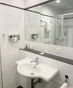Kopalnica v nastanitvi GLANDON Rooms Elite